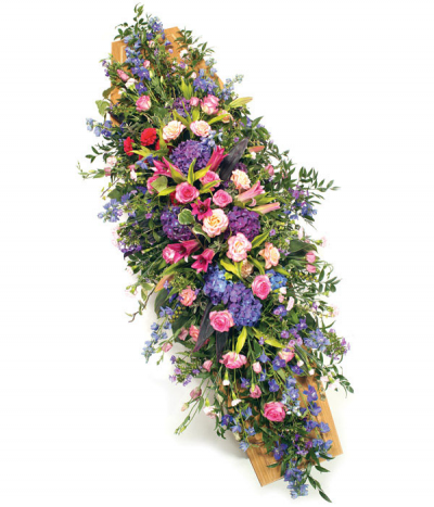 Pink & Blue Garden - A natural, flowing spray in pink and blue hues with a country garden feel. Including roses, hydrangeas, lisianthus and delphinium. 

Please note that sometimes certain flower types may need to be substituted due to seasonal availability. 
We are always happy to work to alternative colour schemes as required- please call us to chat through your ideas.