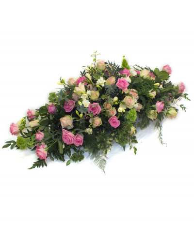La Belle - A gorgeous display of pale pink and bolder pink roses, mixed with fragrant white freesias and offset with elegant natural foliages.
