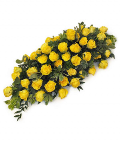 Penny Lane - All yellow roses on a bed of luscious foliage makes for a striking and bright tribute.
