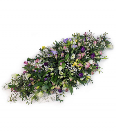 Delicate Beauty - A pretty, fragrant spray of delicate freesias, lisianthus, alstromeria and gypsophila in soft mixed colours- a natural and flowing design ideal for a wicker casket.