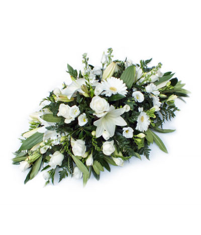 Arctic Queen - An elegant display of pure white mixed flowers, including lilies, gerberas, roses, stocks and freesias.
Please note that flower varieties are subject to seasonal availability and will otherwise be substituted for similar flowers.