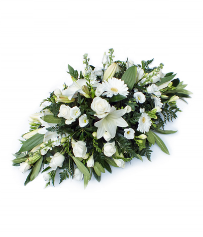 Arctic Queen - An elegant display of pure white mixed flowers, including lilies, gerberas, roses, stocks and freesias.
Please note that flower varieties are subject to seasonal availability and will otherwise be substituted for similar flowers.