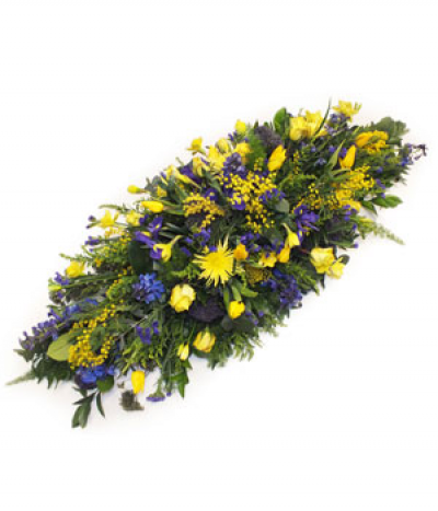 Spring Walk - A beautiful Springlike display in shades of blue and yellow, including daffodils, mimosa, irises and delphinium.
Please note that flower varieties are subject to seasonal availability and will otherwise be substituted for similar flowers.