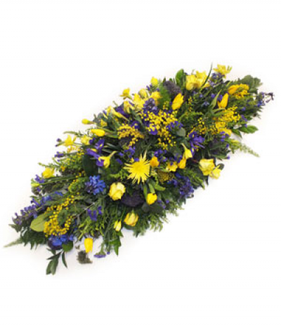 Spring Walk - A beautiful Springlike display in shades of blue and yellow, including daffodils, mimosa, irises and delphinium.
Please note that flower varieties are subject to seasonal availability and will otherwise be substituted for similar flowers.