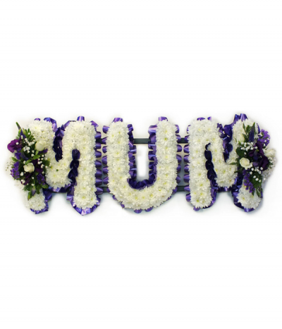 MUM 02 - Lettering "Mum" massed in white chrysanthemums, finished with dainty purple and white sprays at each end. Letters are framed with purple pleated ribbon edging.
Any wording can be created in this style, and colours can be altered to suit your preferences- please call us to discuss.