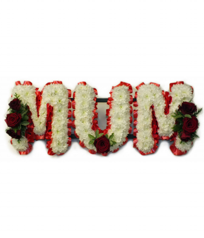 MUM 05 - Lettering "Mum" massed in white chrysanthemums, finished with red rose sprays at each end. Letters are framed with red pleated ribbon edging. Any wording can be created in this style, and colours can be altered to suit your preferences- please call us to discuss.