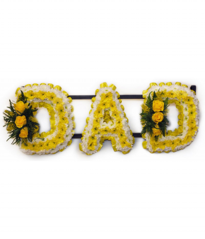 DAD 04 - Lettering "Dad" massed in yellow and white chrysanthemums, finished with yellow rose sprays at each end. Letters are framed with yellow pleated ribbon edging. Any wording can be created in this style, and colours can be altered to suit your preferences- please call us to discuss.