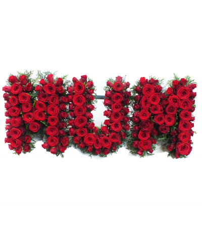 MUM 10 - Lettering "Mum" expertly massed in luxury red roses, finished with touches of green fern. Any wording can be created in this style, and colours can be altered to suit your preferences- please call us to discuss.