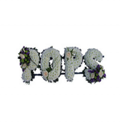 Pops - Lettering "Pops" massed in white chrysanthemums, finished with cream roses and a touch of purple in the sprays along with decorative grasses. The letters are framed with natural greenery edging. Any wording can be created in this style, and colours can be altered to suit your preferences- please call us to discuss.