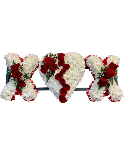 Kiss and Heart Tribute - Stunning tribute to a loved one, incorporating a red rose "broken" heart and two "X" kisses massed in white chrysanthemums with red rose sprays and finished with red pleated ribbon edging.
Colours can be altered to suit your preferences- please call to discuss.