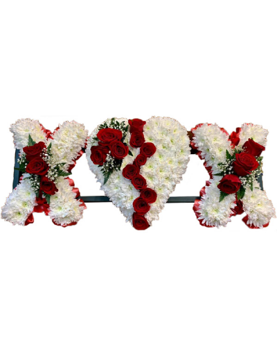 Kiss and Heart Tribute - Stunning tribute to a loved one, incorporating a red rose "broken" heart and two "X" kisses massed in white chrysanthemums with red rose sprays and finished with red pleated ribbon edging.
Colours can be altered to suit your preferences- please call to discuss.