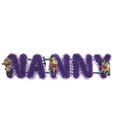 Nanny - Lettering "Nanny" massed in deep dyed-purple chrysanthemums, finished with a lilac pleated ribbon edging, and colourful flower sprays. Any wording can be created in this style, and colours can be altered to suit your preferences- please call us to discuss.
£45.00 per letter.