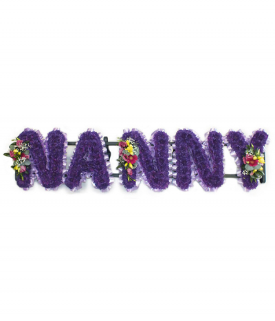 Nanny - Lettering "Nanny" massed in deep dyed-purple chrysanthemums, finished with a lilac pleated ribbon edging, and colourful flower sprays. Any wording can be created in this style, and colours can be altered to suit your preferences- please call us to discuss.
£45.00 per letter.