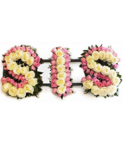 Sis in roses - "Sis" lettering tightly packed with pretty pink and white roses and finished with green foliage edging.
Any wording can be created in this style, and colours can be altered to suit your preferences- please call us to discuss.
Rose lettering @ £100.00 per letter.