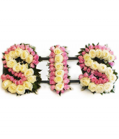 Sis in roses - "Sis" lettering tightly packed with pretty pink and white roses and finished with green foliage edging.
Any wording can be created in this style, and colours can be altered to suit your preferences- please call us to discuss.
Rose lettering @ £100.00 per letter.