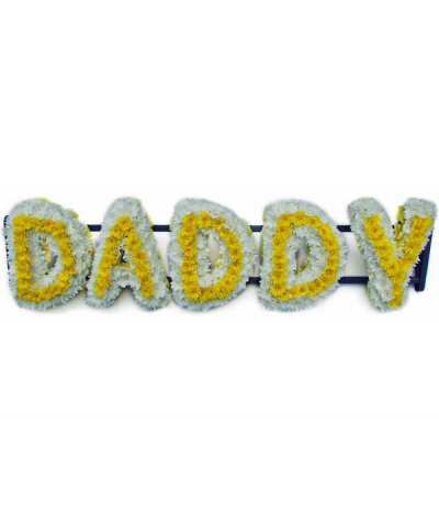 Daddy - Lettering "Daddy" massed in striking yellow and white chrysanthemums. Letters are framed with white pleated ribbon edging. Any wording can be created in this style, and colours can be altered to suit your preferences- please call us to discuss.
£45.00 per letter.
