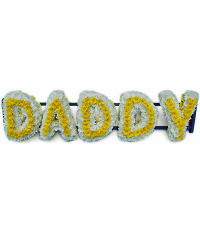 Daddy - Lettering "Daddy" massed in striking yellow and white chrysanthemums. Letters are framed with white pleated ribbon edging. Any wording can be created in this style, and colours can be altered to suit your preferences- please call us to discuss.
£45.00 per letter.