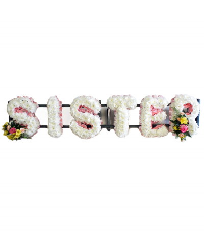 Sister - "Sister" lettering in white massed chrysanthemums, framed with a soft pink pleated ribbon edging and finished with pretty pink and yellow flower sprays.
Any wording can be created in this style, and colours can be altered to suit your preferences- please call us to discuss.
£45.00 per letter.