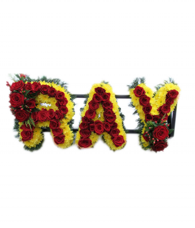 Three-letter name tribute with roses (Ray) - Example lettering "Ray" massed in bright yellow chrysanthemums, with a beautiful line of luxury red roses through the centre, and finished with two sprays of red roses and berries.  The letters are finished with natural greenery edging. 
Any wording can be created in this style, and colours can be altered to suit your preferences- please call us to discuss your requirements or note your three-letter name in the "any special requests" box to order online.
£75.00 per letter in this style with roses.