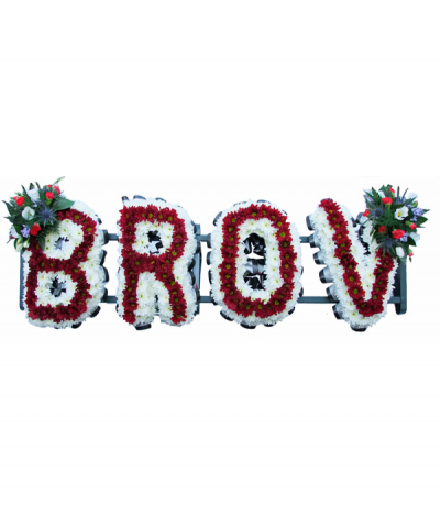 Brov - "Brov" lettering (can be altered to "Bruv" if preferred) in massed white and deep red chrysanthemums with two red and blue flower sprays and double-pleated navy and white ribbon edging to frame the letters.
 Any wording can be created in this style, and colours can be altered to suit your preferences- please call us to discuss your requirements or note your four-letter name in the "any special requests" box to order online.
£45.00 per letter.