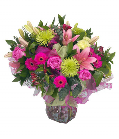 Cerise & Lime - A zesty mix of vibrant cerise-pink and lime green blooms arranged as a handtied bouquet in water and presented in a gift bag/box.