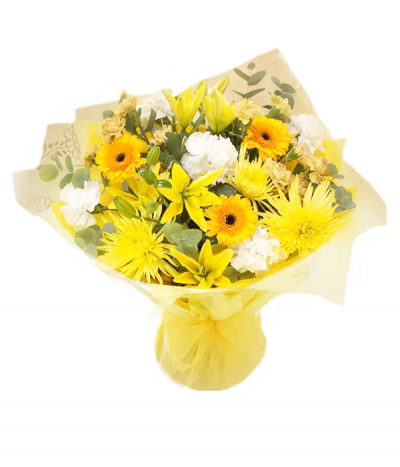 Brighten Your Day - A fresh and bright handtied bouquet in water, presented in a gift bag/box. Created using a seasonal mix of yellows and whites including gerberas and chrysanthemums.