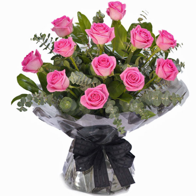 Pink Pearl - A stunning display of 12x luxury pink roses with lush foliages, handtied in water and presented in a gift bag/box.