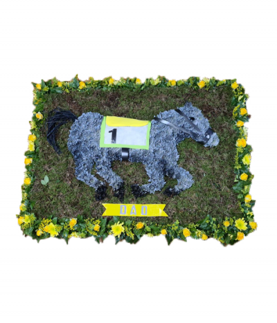 Racehorse - A stunning tribute to a horse-racing fan, this mossed base features an expertly crafted racehorse using dyed chrysanthemums with ribbon and decal trimmings