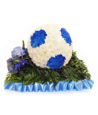 Football Tribute - The ideal tribute for a football fan, this 3D football design is crafted in massed blue-dyed and white chrysanthemums, and stood on a greenery base with complimenting blue flower