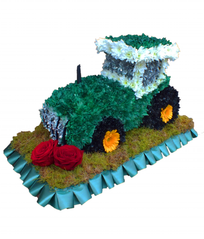 3D Tractor Tribute - A large 3D tractor design, massed using dyed chrysanthemums and on a moss base with red rose detail and framed in pleated ribbon edging.