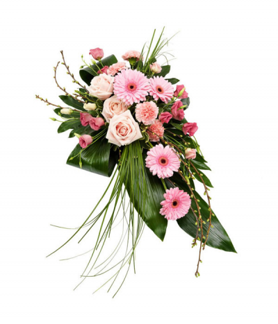 Perfect Pinks - A contemporary grouped- style single-ended spray using various soft pink seasonal flowers complimented with striking grasses and leaves.