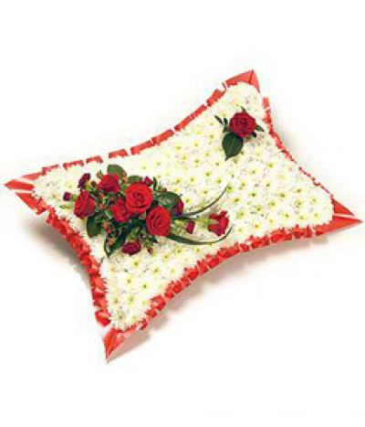 Red Remembrance Pillow - classic pillow tribute, neatly massed in white chrysanthemums and featuring striking red rose accents. The design is finished with a pleated red ribbon edge to frame and enhance.