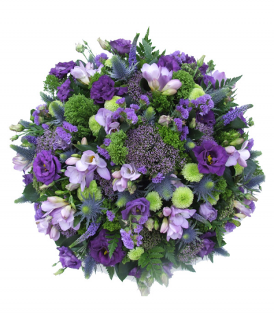 Purple Light Posy - A glorious display of mixed purple, lilac and blue, lifted with a touch of lime green and arranged in a classic posy pad design.