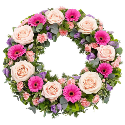 Pastel Wreath - A classic wreath in pretty pastel shades, including soft pink roses, cerise gerberas, pink carnations, lilac lisianthus and more
