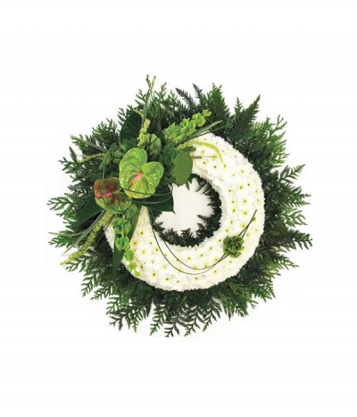 Dreams Wreath - A contemporary design, featuring a striking selection of lime green exotic flowers as a spray on a background of classic white massed chrysanthemums, and framed with showy conifer