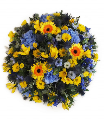 Summer Blooms Posy - A striking selection of blue and yellow seasonal flowers come together in this glorious posy pad design, featuring gerberas, freesias, thistle, chrysanthemums and more