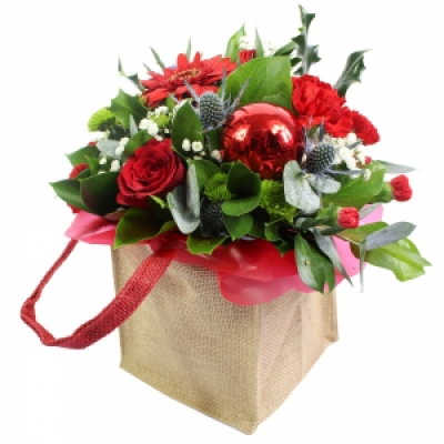 Seasons Greetings - A unique Christmas gift bag, professionally arranged and delivered by a local florist. 