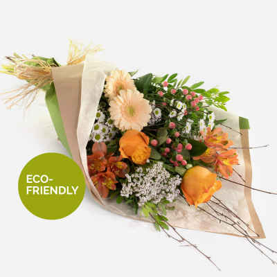 Peaches and Cream - A beautiful collection of flowers simply wrapped and ready to arrange.