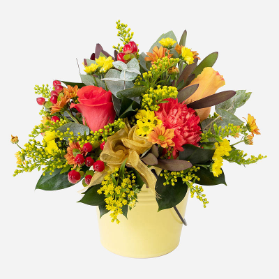 Pot of Gold Arrangement - The best gifts come in small packages. Inspire them this Autumn with a petite arrangement combining the seasonal favourites. Made and delivered by an artisan florist.