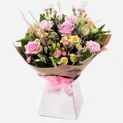 Nature's Bliss - Show your love in the best possible way with this gorgeous hand-tied bouquet featuring a fabulous selection of flowers