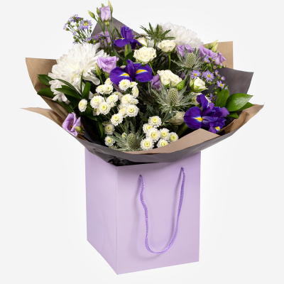 Violet - An impressive hand-tied of purple and white flowers, presented in a complimentary gift bag or box to make your gift feel extra special.