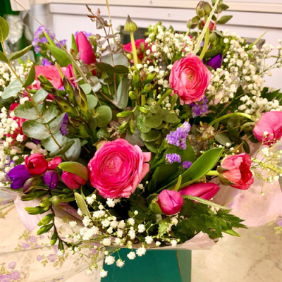 Fairytale Ending - A enchanting bouquet in water presented in a gif bag/box. Created using pink, purple and white flowers with complimentary foliage. Hand delivered with care in and around Littlehampton by Findon Flowers