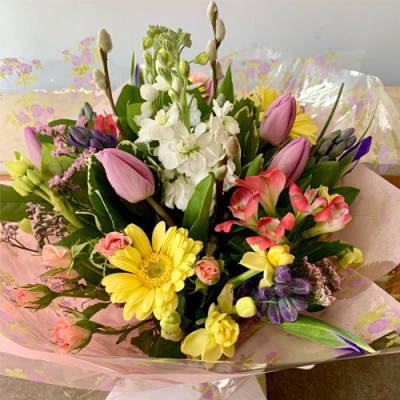Picked for You - A lovely bouquet in water presented in a gif bag/box. Created using pastel pink, purple and yellow flowers with complimentary foliage. Hand delivered with care in and around Littlehampton by Findon Flowers