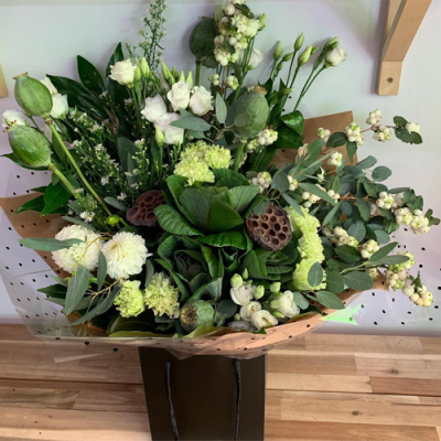 Always Classy - A stunning bouquet in water presented in a gif bag/box. Created using all white flowers with complimentary foliage. Hand delivered with care in and around Littlehampton by Findon Flowers